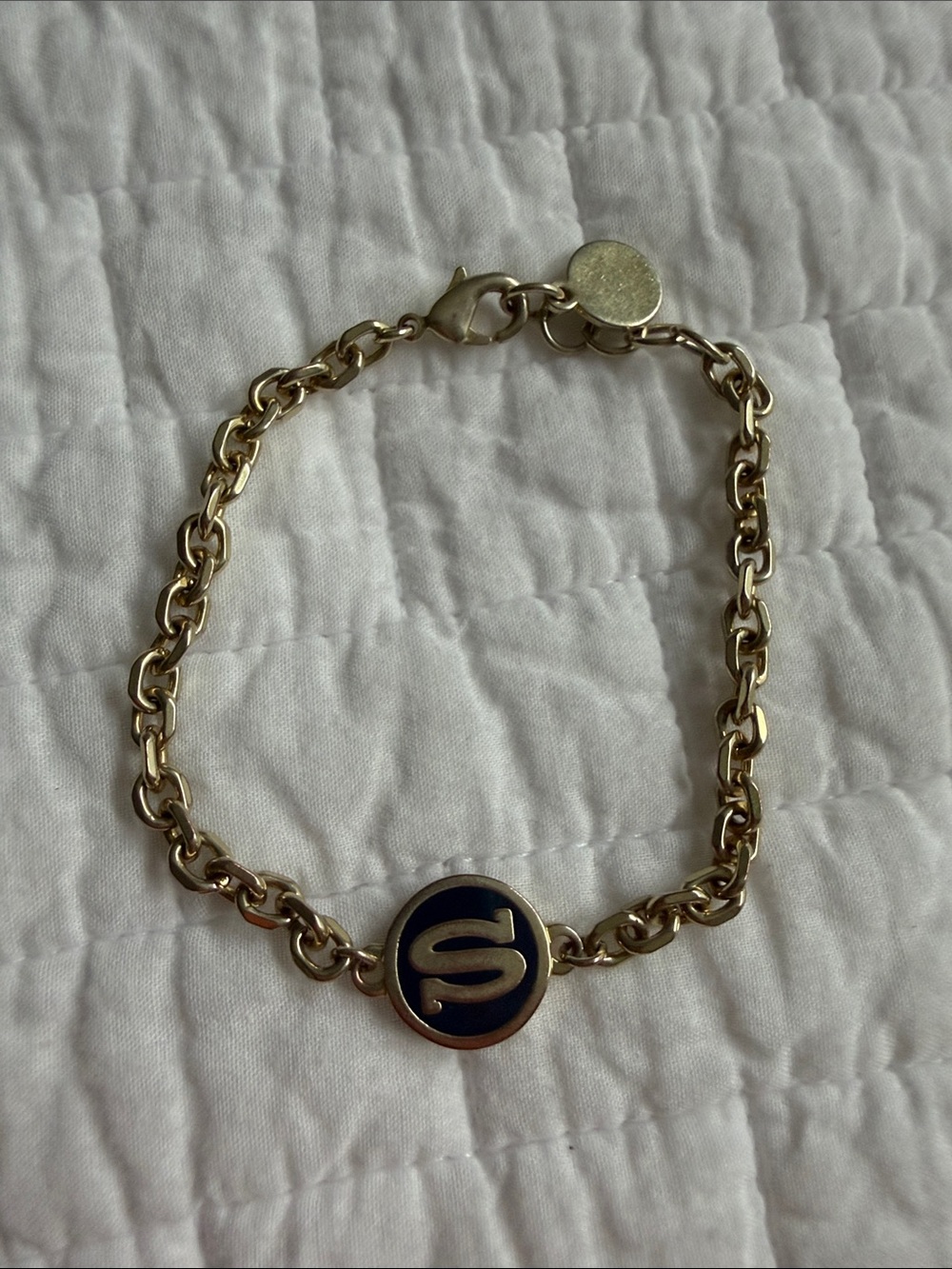 C. Wonder Gold-Tone Chain Bracelet with Navy Enamel 'S' Charm